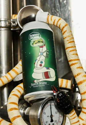 beer can with illustration of snake in an astronaut outfit with a background of space